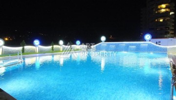 Квартира 2+1 с отдельной кухней в Махмутларе. Всего 400 метров до моря - Ракурс 31