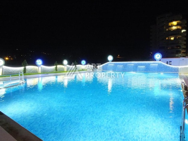 Квартира 2+1 с отдельной кухней в Махмутларе. Всего 400 метров до моря - Ракурс 30