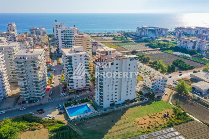 Квартира 2+1 с отдельной кухней в Махмутларе. Всего 400 метров до моря - Ракурс 33