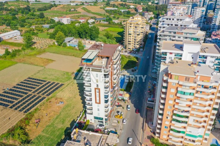 Квартира 2+1 с отдельной кухней в Махмутларе. Всего 400 метров до моря - Ракурс 35