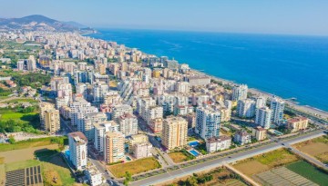 Квартира 2+1 с отдельной кухней в Махмутларе. Всего 400 метров до моря - Ракурс 37