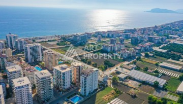 Квартира 2+1 с отдельной кухней в Махмутларе. Всего 400 метров до моря - Ракурс 38