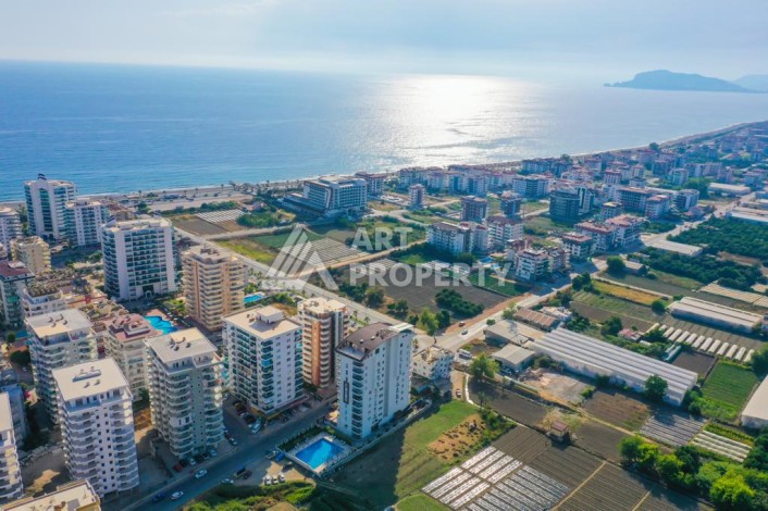 Квартира 2+1 с отдельной кухней в Махмутларе. Всего 400 метров до моря - Ракурс 37