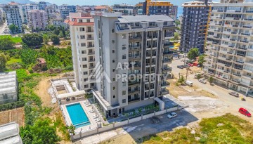 Квартира 2+1 в новом доме в 300 метрах от моря. Махмутлар, Аланья - Ракурс 2