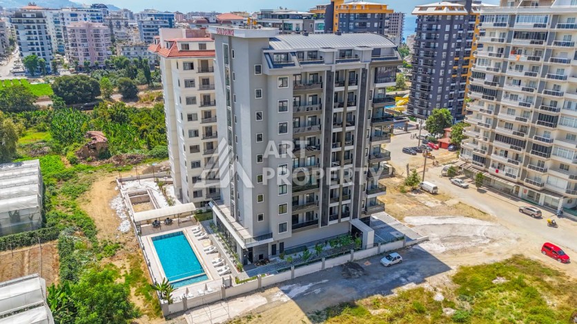 Квартира 2+1 в новом доме в 300 метрах от моря. Махмутлар, Аланья - Ракурс 1