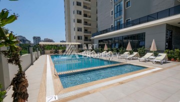 Квартира 2+1 в новом доме в 300 метрах от моря. Махмутлар, Аланья - Ракурс 3