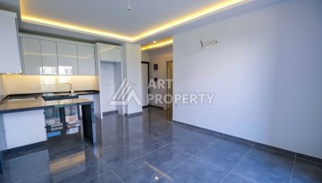 Квартира 2+1 в новом доме в 300 метрах от моря. Махмутлар, Аланья - Ракурс 11