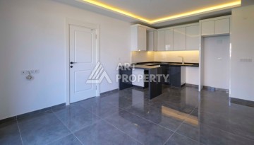 Квартира 2+1 в новом доме в 300 метрах от моря. Махмутлар, Аланья - Ракурс 12