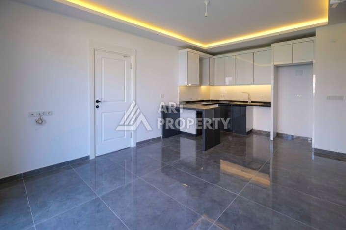 Квартира 2+1 в новом доме в 300 метрах от моря. Махмутлар, Аланья - Ракурс 11