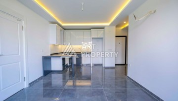 Квартира 2+1 в новом доме в 300 метрах от моря. Махмутлар, Аланья - Ракурс 16