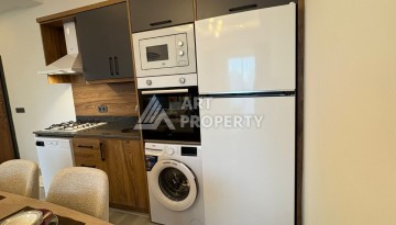 Квартира 2+1 с мебелью в центре Махмутлара, 77 кв.м. - Ракурс 4