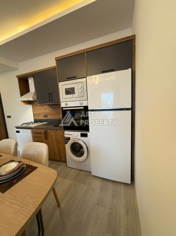 Квартира 2+1 с мебелью в центре Махмутлара, 77 кв.м. - Ракурс 3