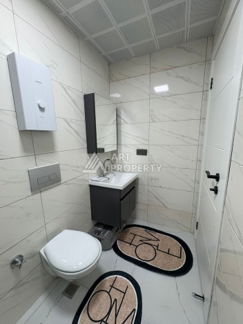 Квартира 2+1 с мебелью в центре Махмутлара, 77 кв.м. - Ракурс 11