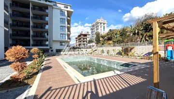 Квартира 2+1 с мебелью в центре Махмутлара, 77 кв.м. - Ракурс 21