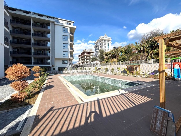 Квартира 2+1 с мебелью в центре Махмутлара, 77 кв.м. - Ракурс 20