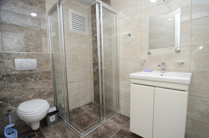 Четырехкомнатная квартира в современном комплексе в районе Махмутлар, Алания, 145 м2 - Ракурс 16