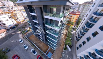 Квартиры от 59 кв.м. в центре Алании. Новый бутик-комплекс с инфраструктурой. - Ракурс 7