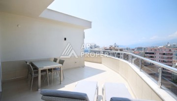 Пентхаус 3+1 с панорамным видом на море и горы в районе Махмутлар - Ракурс 40