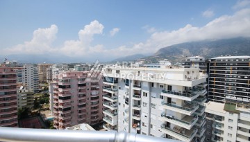 Пентхаус 3+1 с панорамным видом на море и горы в районе Махмутлар - Ракурс 53