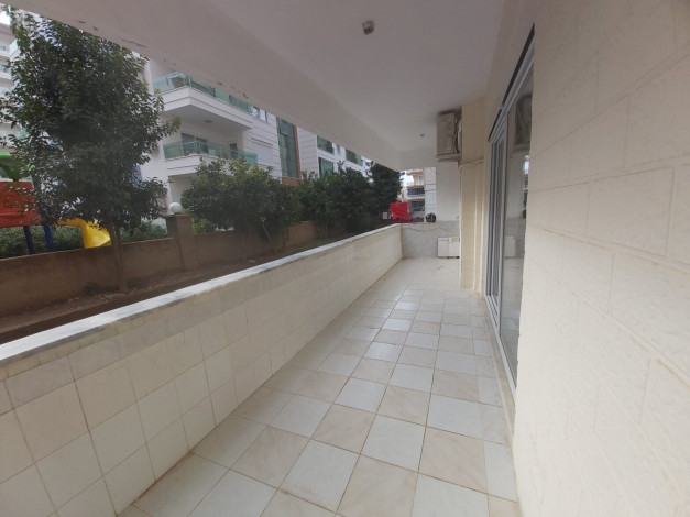 Срочная продажа трехкомнатной квартиры с отдельной кухней в районе Махмутлар, 105 м2 - Ракурс 6