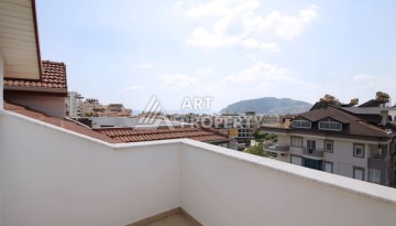 Просторный пентхаус 4+2 с видом на море в центре Алании - Ракурс 46