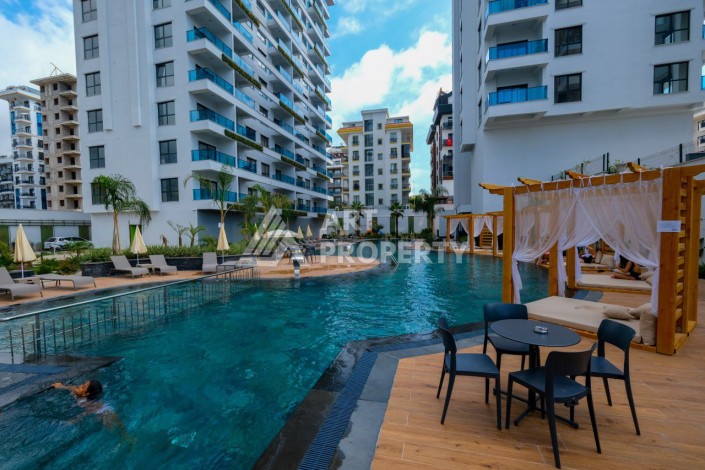 Квартира 1+1, 55 м² в центре Махмутлара. Стильная новая резиденция. - Ракурс 0