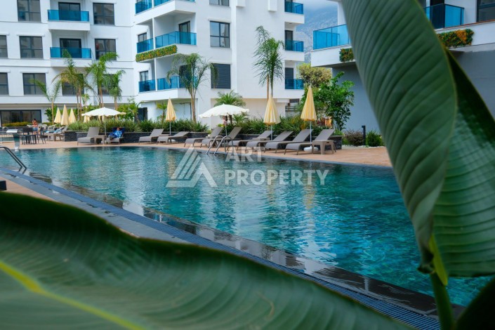 Квартира 1+1, 55 м² в центре Махмутлара. Стильная новая резиденция. - Ракурс 1