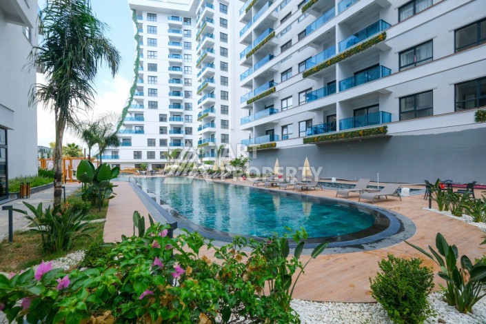 Квартира 1+1, 55 м² в центре Махмутлара. Стильная новая резиденция. - Ракурс 4