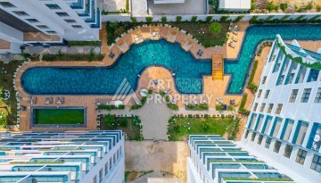 Квартира 1+1, 55 м² в центре Махмутлара. Стильная новая резиденция. - Ракурс 6