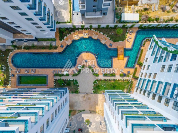 Квартира 1+1, 55 м² в центре Махмутлара. Стильная новая резиденция. - Ракурс 5