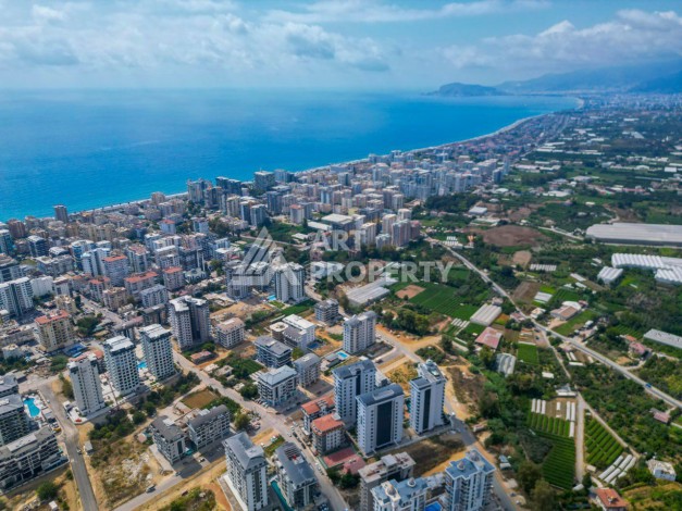 Квартира 1+1, 55 м² в центре Махмутлара. Стильная новая резиденция. - Ракурс 9