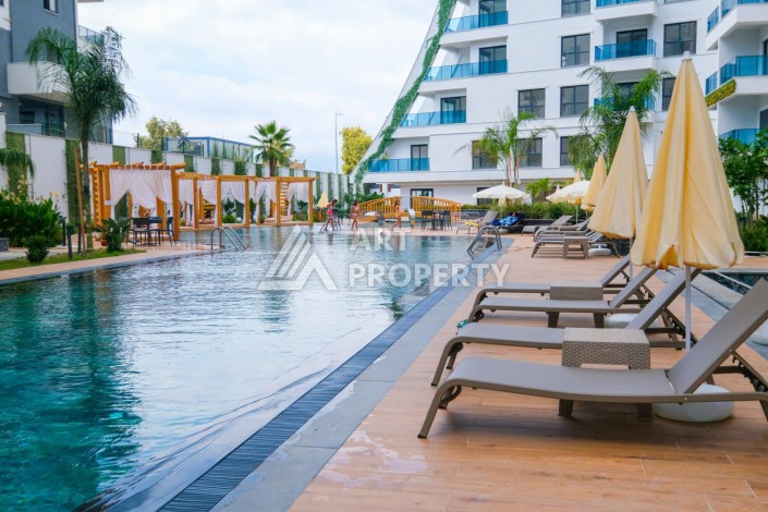 Квартира 1+1, 55 м² в центре Махмутлара. Стильная новая резиденция. - Ракурс 11