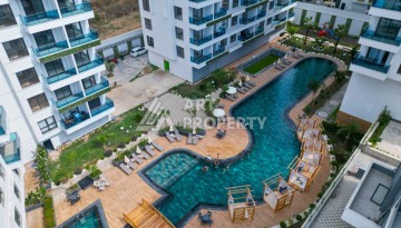 Квартира 1+1, 55 м² в центре Махмутлара. Стильная новая резиденция. - Ракурс 13