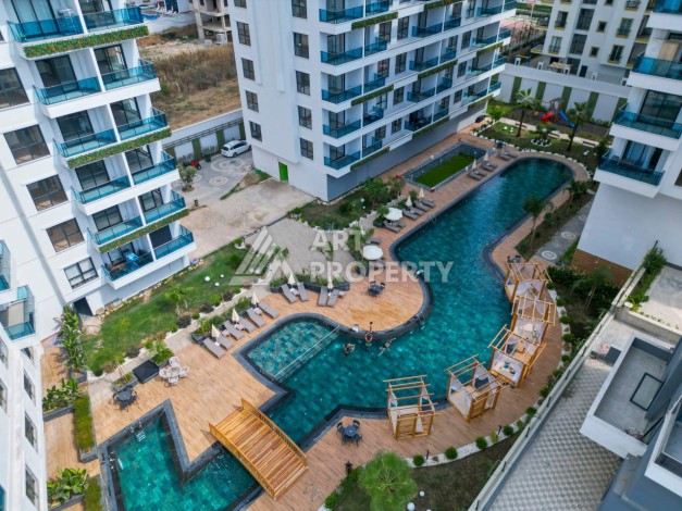 Квартира 1+1, 55 м² в центре Махмутлара. Стильная новая резиденция. - Ракурс 12