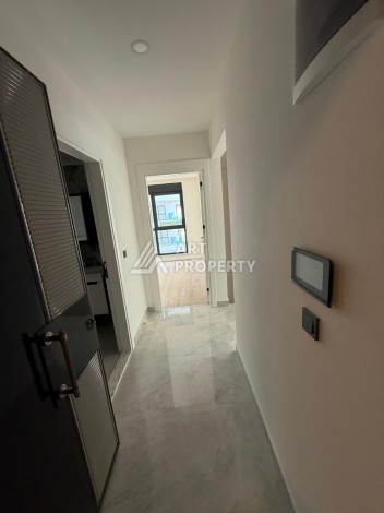 Квартира 1+1, 55 м² в центре Махмутлара. Стильная новая резиденция. - Ракурс 13