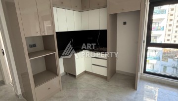 Квартира 1+1, 55 м² в центре Махмутлара. Стильная новая резиденция. - Ракурс 20