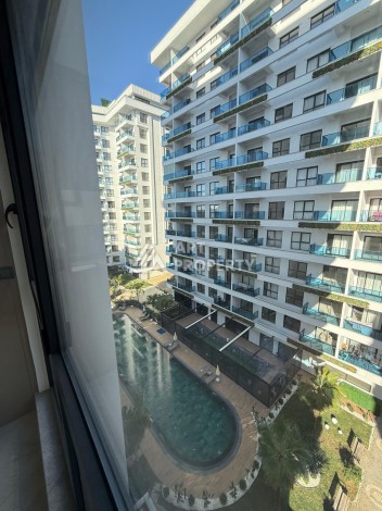 Квартира 1+1, 55 м² в центре Махмутлара. Стильная новая резиденция. - Ракурс 21