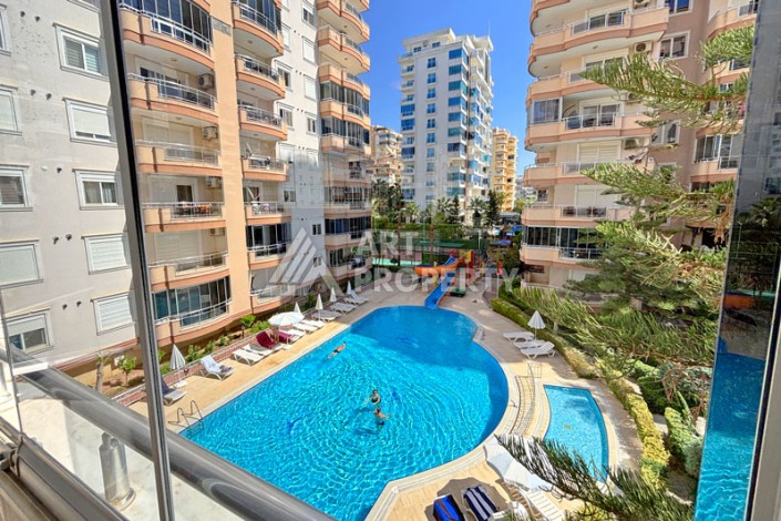 Просторная квартира 2+1 в ухоженном комплексе у моря в районе Махмутлар - Ракурс 0