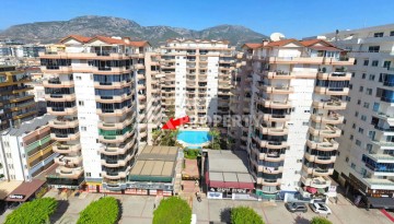 Просторная квартира 2+1 в ухоженном комплексе у моря в районе Махмутлар - Ракурс 2