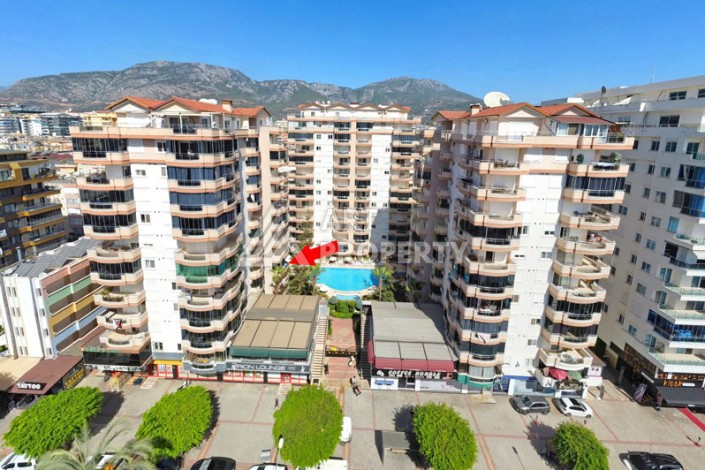 Просторная квартира 2+1 в ухоженном комплексе у моря в районе Махмутлар - Ракурс 1