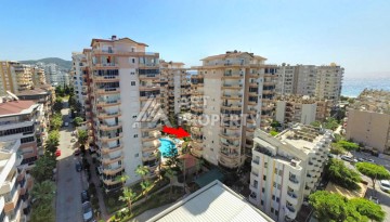 Просторная квартира 2+1 в ухоженном комплексе у моря в районе Махмутлар - Ракурс 40