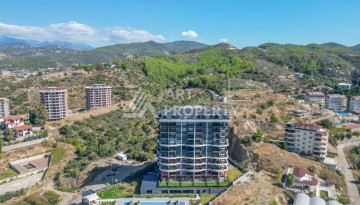 Квартиры 1+1, 2+1, дуплексы 2+1 и 3+1 в элитной качественной резиденции. Демирташ, Алания - Ракурс 1