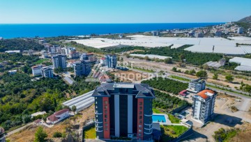 Квартиры 1+1, 2+1, дуплексы 2+1 и 3+1 в элитной качественной резиденции. Демирташ, Алания - Ракурс 5