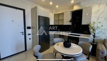 Квартиры 1+1, 2+1, дуплексы 2+1 и 3+1 в элитной качественной резиденции. Демирташ, Алания - Ракурс 44