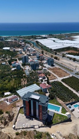 Квартиры 1+1, 2+1, дуплексы 2+1 и 3+1 в элитной качественной резиденции. Демирташ, Алания - Ракурс 53