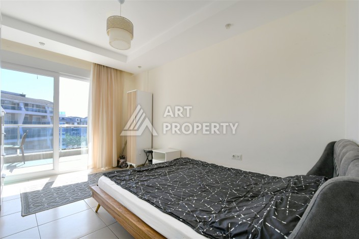 Квартира 1+1 в престижной резиденции, 65 м². Джикджилли, Алания - Ракурс 3