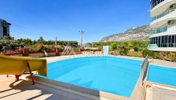 Просторная квартира 2+1 в Махмутларе, 115 кв.м. С видом на горы - Ракурс 45