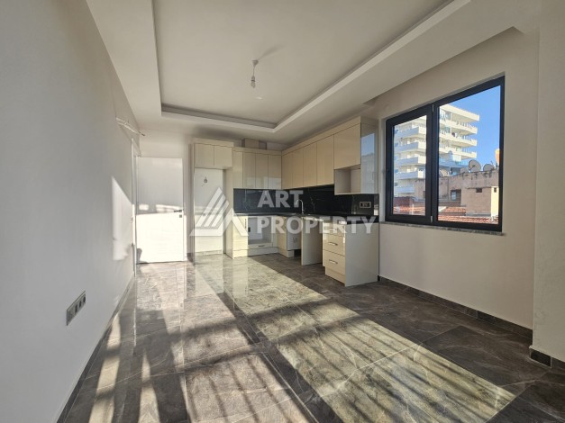 Квартира 2+1 в Махмутларе в 150 метрах от моря - Ракурс 1