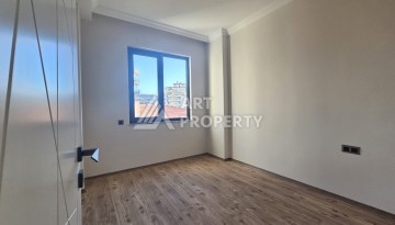 Квартира 2+1 в Махмутларе в 150 метрах от моря - Ракурс 12