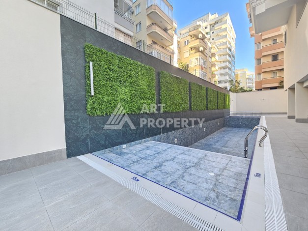 Квартира 2+1 в Махмутларе в 150 метрах от моря - Ракурс 28